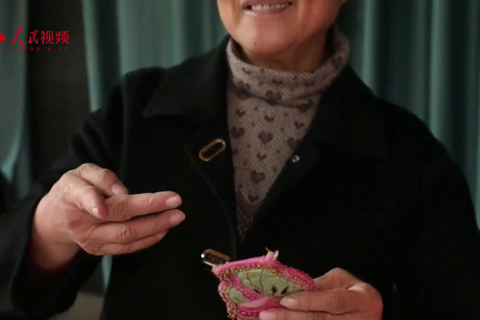 师徒传承的一枚荷包 